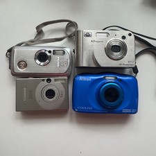 Lot of 4 digital cameras, Canon, Nikon, HP Photosmart, Pentax. UNTESTED *PARTS*