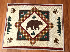Quilted table topper or wall hanger with a bear in a square new handmade 23 x 28