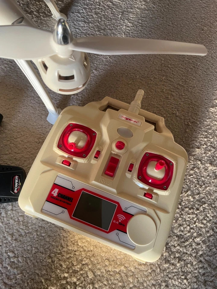 syma Quadrocopter mit Kamera Fernbedienung Ladestadion Drohne ohne Akku defekt - Bild 2 von 4