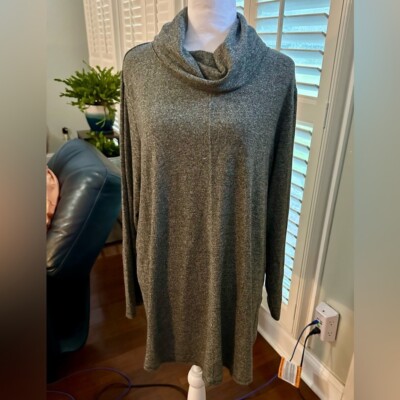 Long sleeve flowing turtleneck sweater.