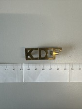 Kenya Defence Force brass shoulder title colonial dowler maker marked militaria
