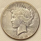 1928 P Peace silver dollar in good condition (some wear)  low mintage