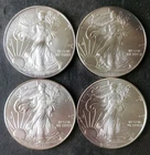 One 2008 and Three 2015 $1 American Silver Eagle Dollars