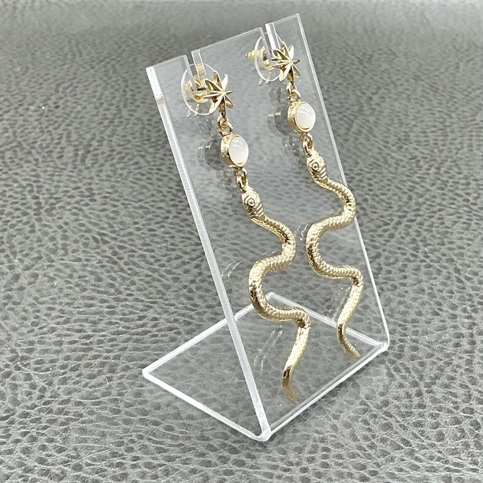 Pendientes colgantes de serpiente tono dorado llamativos perforados Starburst cabujón blanco Foto 3 de 4