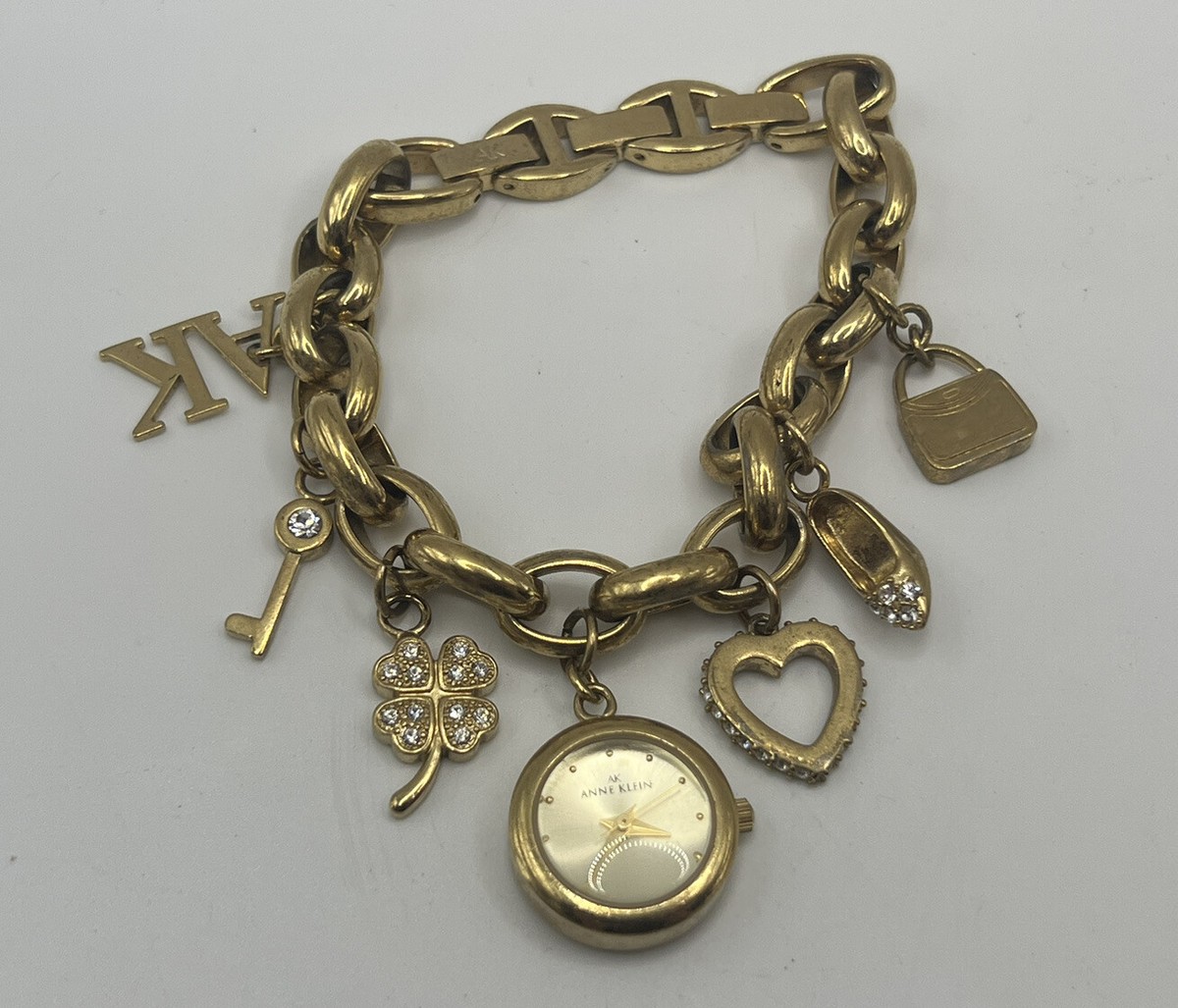 Anne Klein 10/7604GP New Battery Ladies Charm Watch 20MM 7.5\