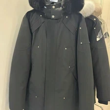 Moose Knuckles Women's mid-length coat with hooded fox fur collar