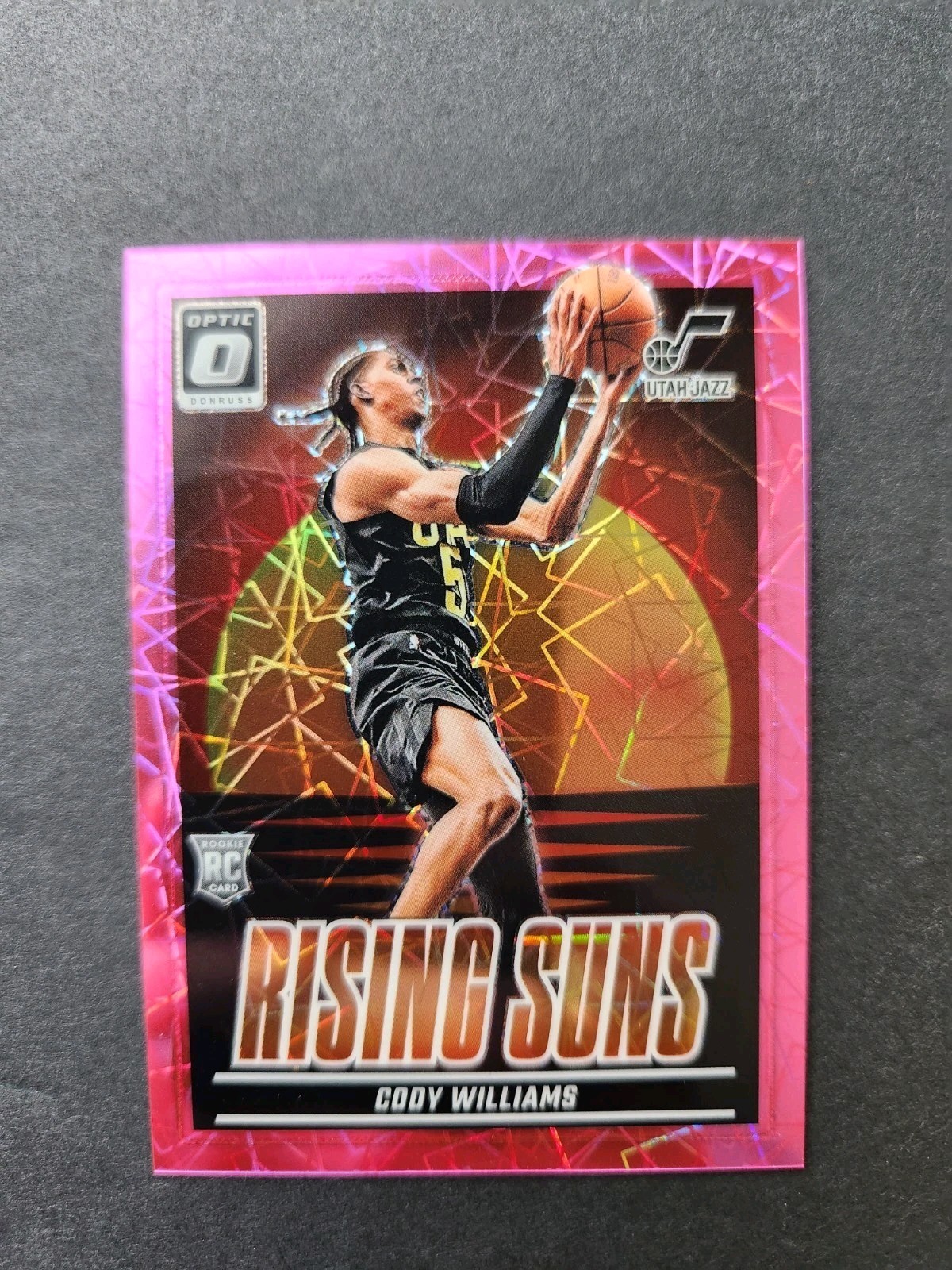 2024-25 Donruss Optic Cody Williams #8 RC Rising Suns Pink Velocity #/79
