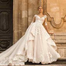 Luxurious O-neck A-line long sleeved applique floor length wedding dress