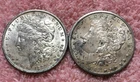 MORGAN SILVER DOLLAR COINS.  LOT OF 2  AU. / UNC. DETAILS  PRE. 1921   LOT # 31