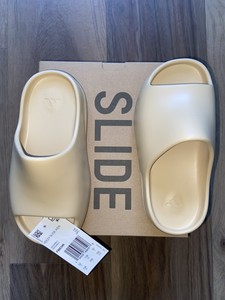 adidas YEEZY SLIDE EARTH BROWN YEEZY SLIDE BONE AND.