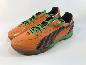 orange and blue puma boots