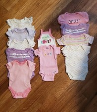 Lot of short sleeved newborn girl bodysuits and pants, 12 items