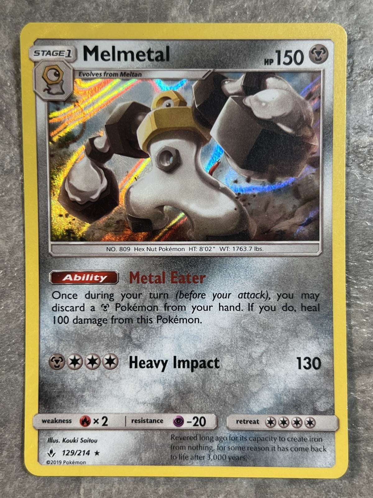 Melmetal 129/214 Pokemon TCG Card Sm-Unbroken Bonds Holo Rare (Near Mint) NM