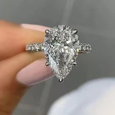 4CTW Pear Cut D Moissanite Hidden Halo Engagement Ring In 14k White Gold Plated