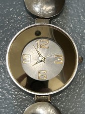 Gold Tone Bezel Silver Tone Band Women s Quartz Watch