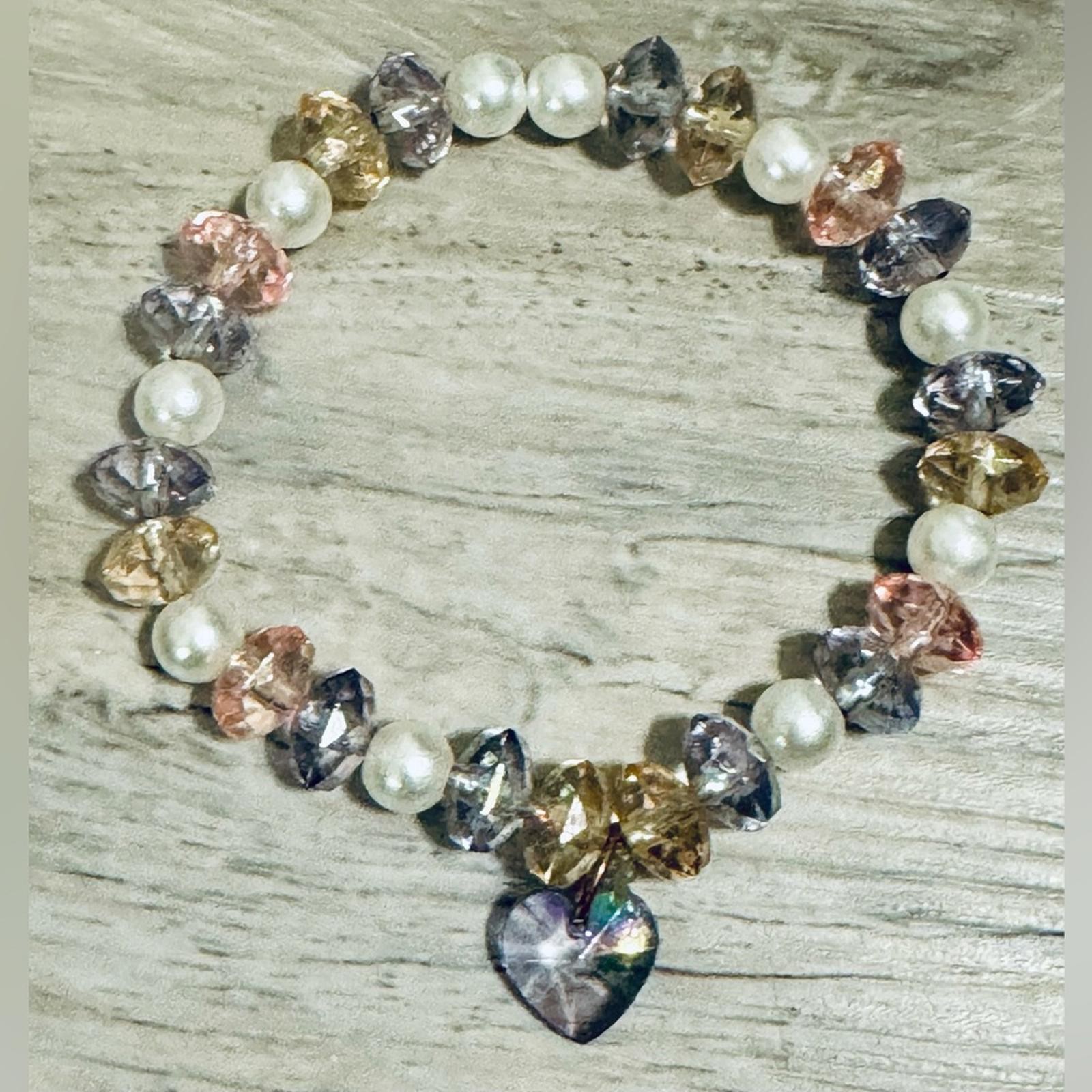 A multi-color translucent crystal bead bracelet w… - image 1