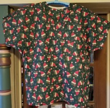Tafford Santa Hats Green sparkly background scrubs with chest pocket size M
