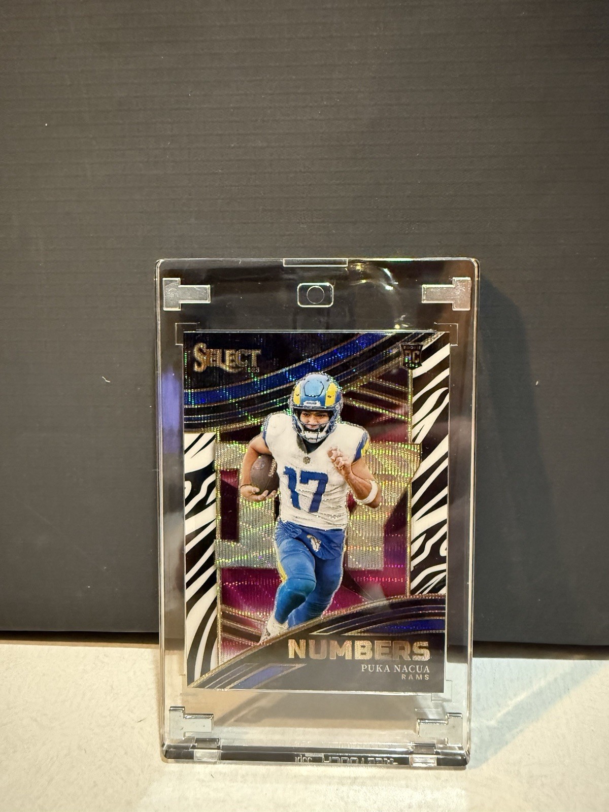 2023 Panini Select - Numbers Puka Nacua Zebra Prizm (RC)