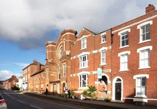 Photo A3 The Homend, Ledbury Red brick terraced buildings including a fo c2021