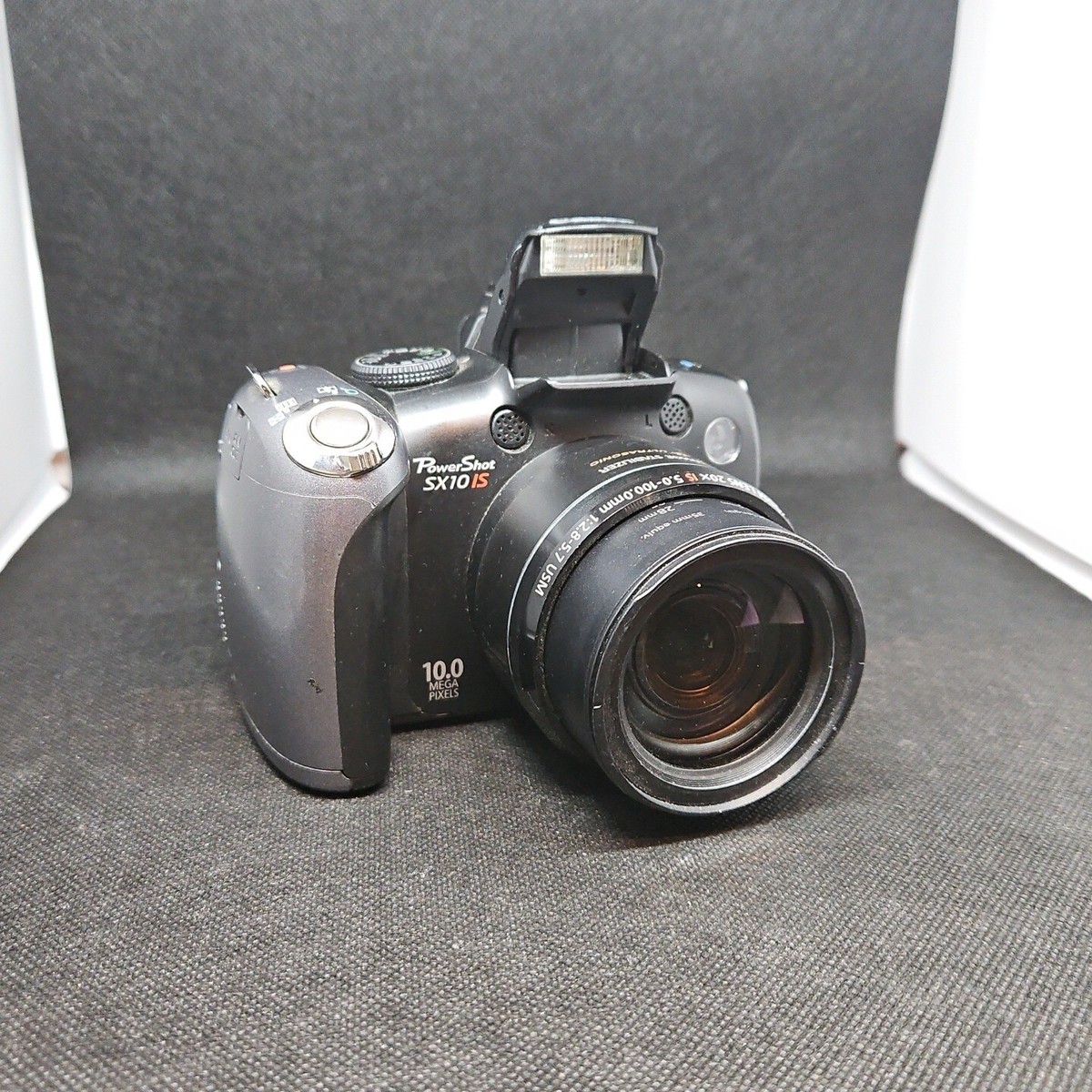 Working Canon Powershot SX10 IS 10.0MP 20x Digital Camera Working Canon Powershot SX10 IS 10.0MP 20x Digital Camera