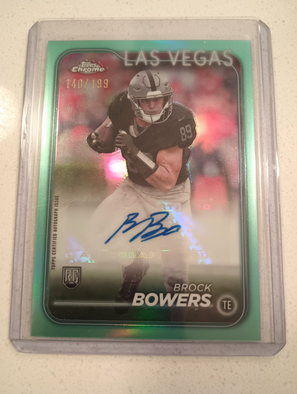 2024 Topps Chrome - Brock Bowers - Rookie Autographs Aqua Refractor #140/199 RC