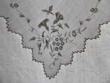 19th century linen handkerchief embroidered with flowering branches and insects