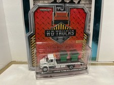 1/64 SCALE - GREENLIGHT H.D. TRUCKS - 2013 INTERNATIONAL DURASTAR FLATBED