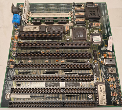 386 MG 8517 REV:0.0 Motherboard with AMD SXL-33 CPU + 2 MB RAM