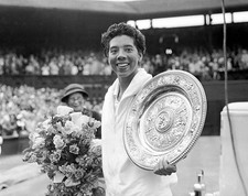 Althea Gibson shows off Ladies Singles trophy after her straight s- Old Photo