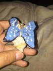 Ceramic seashell with a butterfly on top — photo 1