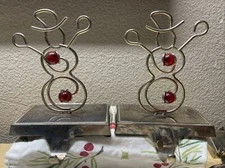 Pair Of Silver Played Snowmen Stocking Holders Mantle Hook Wire W/ Red Marbles