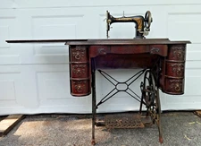 1900's Antique Minnesota Treadle Sewing Machine with  7 Drawer Cabinet