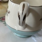 Floral Ceramic Creamer with Light Blue Base, Decorative Handle, Glossy Finish — photo 3