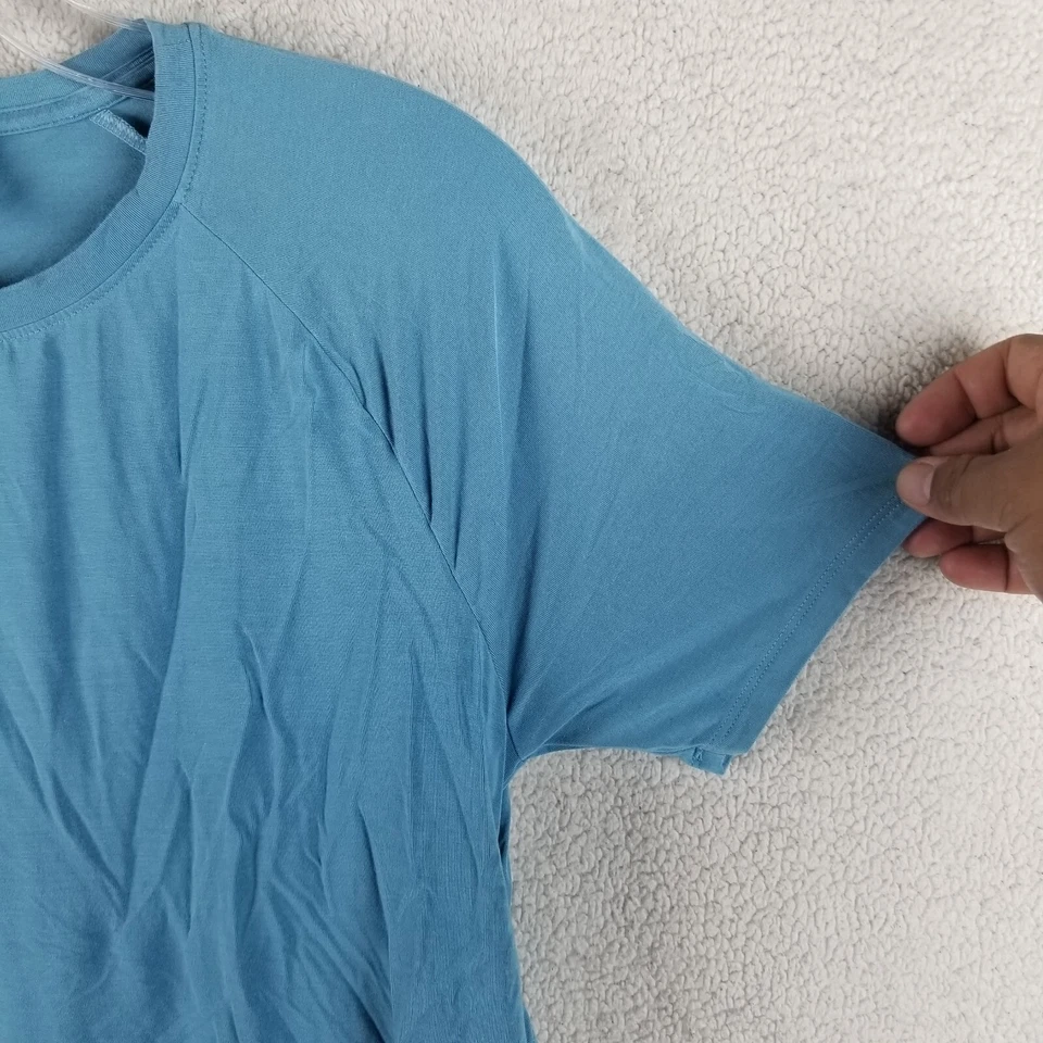 Camisa de rendimiento suelta manga corta corte espalda abierta azul Under Armour para mujer XS Foto 3 de 4