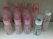 Lot Of Dr Brown's Baby Bottles 4  8 oz those with caps are complete. see pics