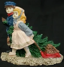 BOY w/ CHRISTMAS TREE GIRL w/ FIRE WOOD on SLED Winter Village Artmark FIGURE