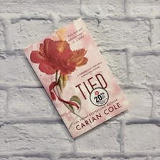Tied by Carian Cole paperback book | Grand Central Publishing