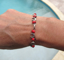 7" Huayruro Seed Beads with Silver Plated Horseshoe Charms Bracelet