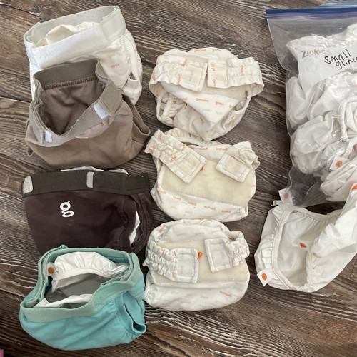 Extra Small And Small size G Diapers, 4 Small, 3 Extra Small, Plus Plastic Liner