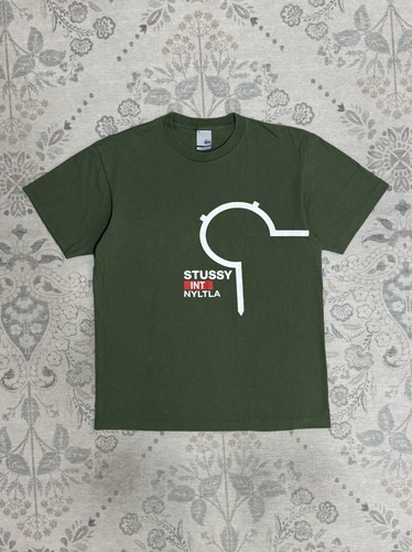 Stüssy, Vintage 90s Stüssy INT NYLTLA Graphic Tee Olive Single Stitch Made In USA Medium