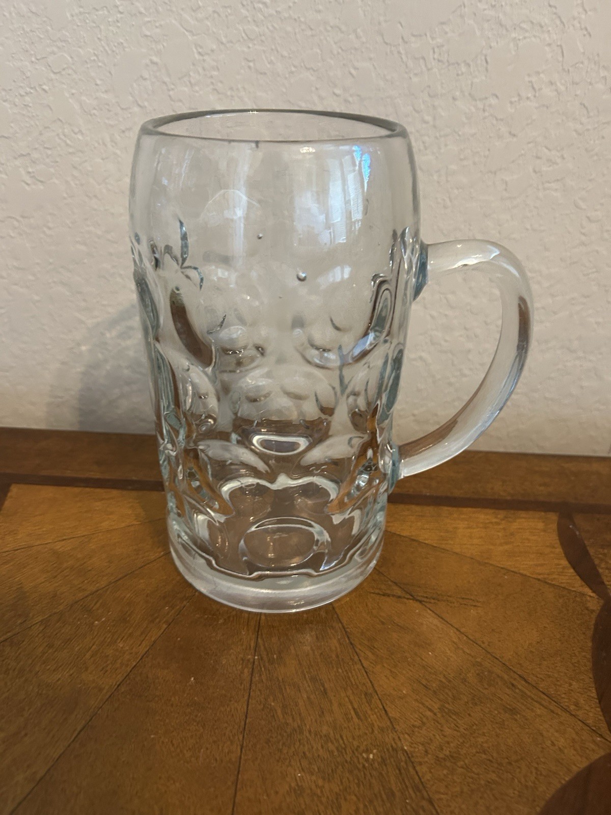 Large thick dimpled glass German mass beer mug with handle
