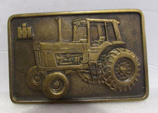 Vintage International Harvester Spec Cast Rockford IL Belt Buckle Tractor Logo
