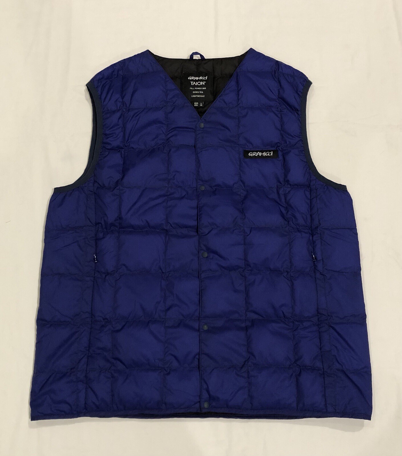 Chaleco de plumón ligero Gramicci Taion FILL POWER 800 azul para hombre talla Asia L EE. UU. M