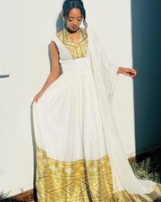 Graceful Ethiopian Traditional Dress with Subtle Gold Details