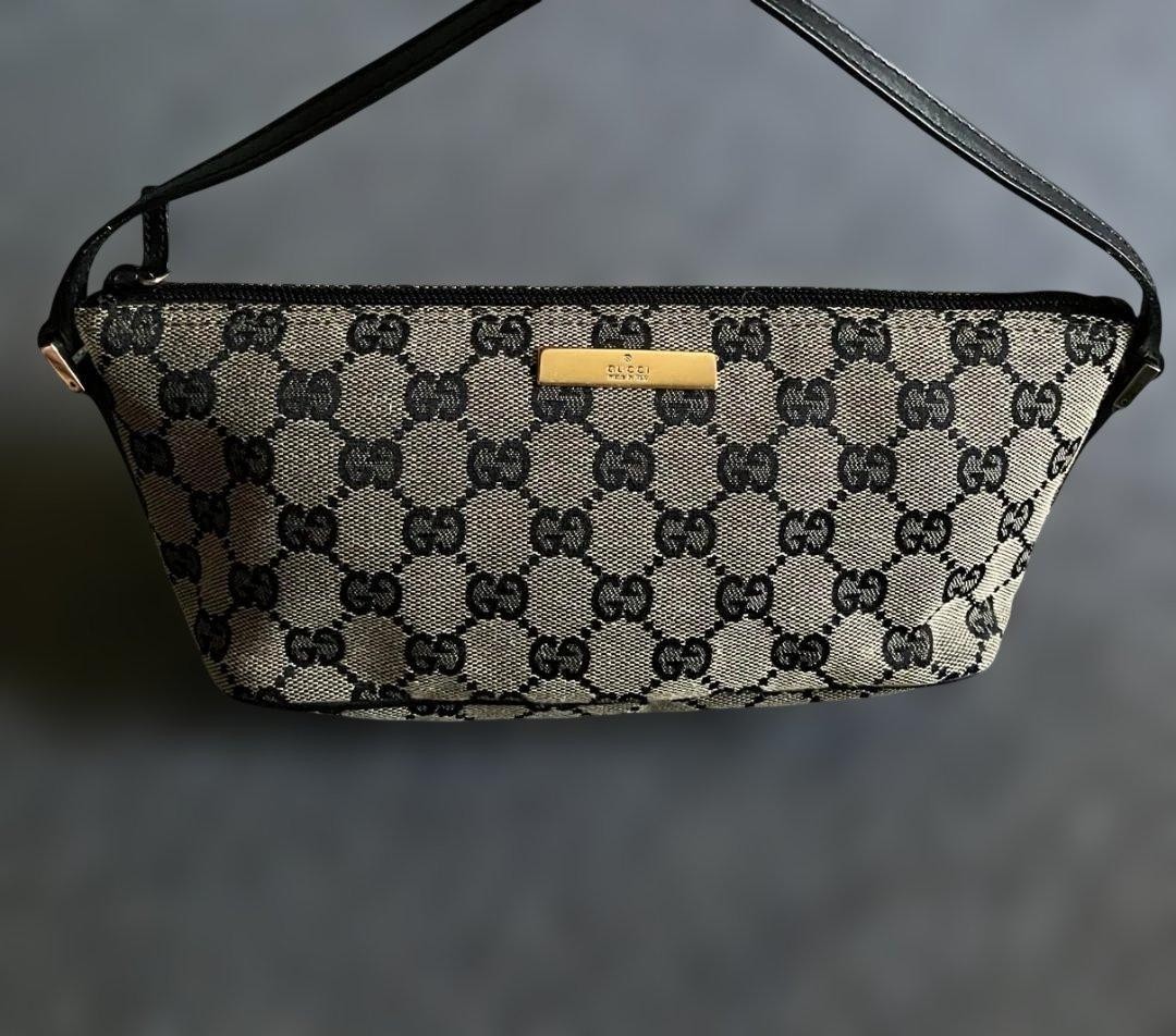 Authentic GUCCI GG Canvas Accessory Pouch Black Handbag Gold Logo Plate