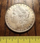 1885-P  Morgan 90% Silver Dollar BU Toning