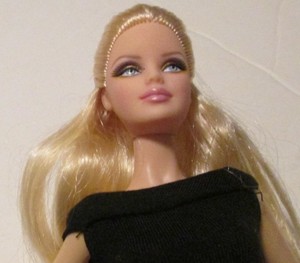 black barbie doll with blonde hair