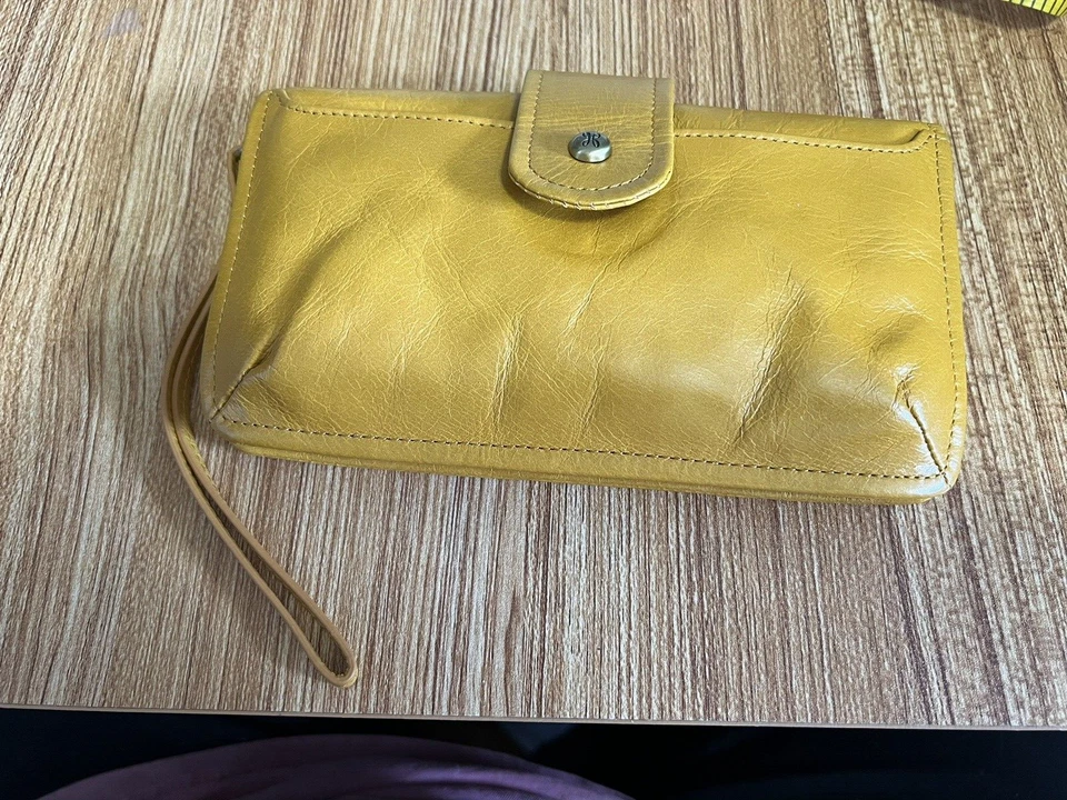 NUEVO CON ETIQUETAS Hobo International Galaxy Cartera de Cuero Muñequera Ámbar Precio de venta sugerido por el fabricante 128 USD Foto 3 de 4