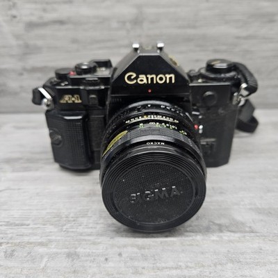 Canon A-1 SLR Film Camera + 28mm f/2.8 Multicoated Lens Untested