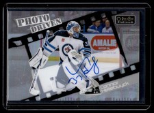 2024-25 O-Pee-Chee Platinum Photo Driven Rainbow Connor Hellebuyck Auto #PD-10